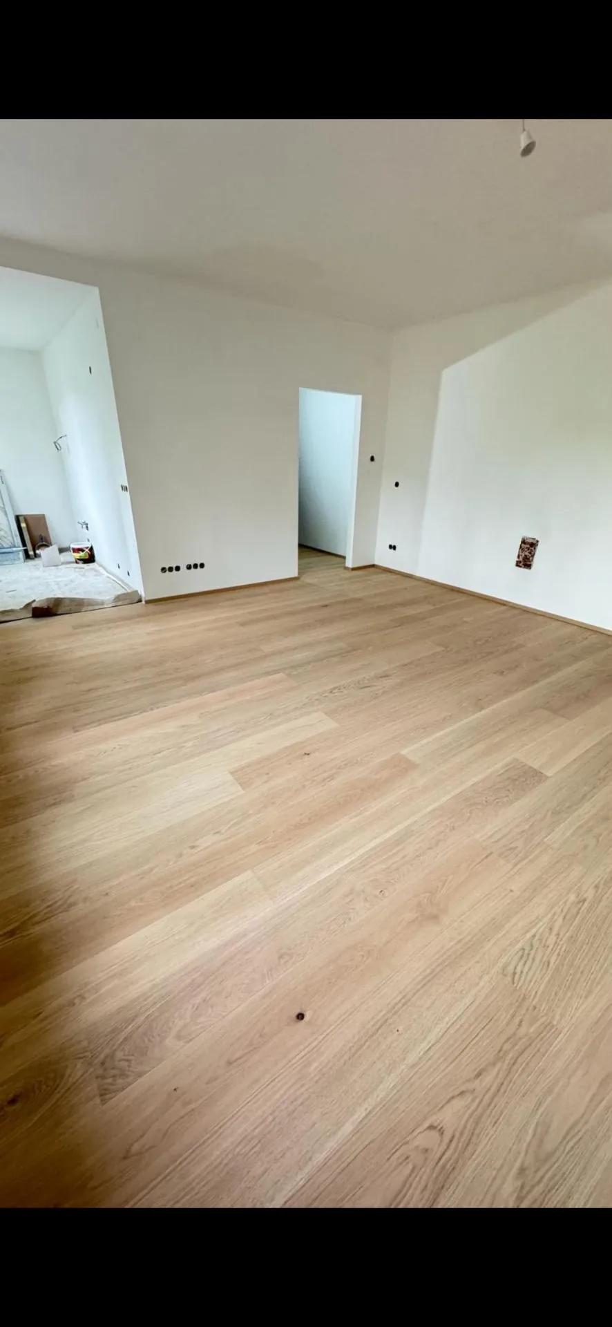 Fertiges Wohnzimmer der Kernsanierung Oberzellergasse 1030 Wien
